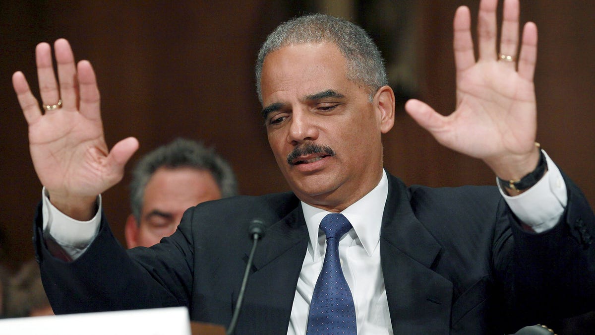 Attorney General Eric Holder, who has not lifted a gag order on Internet companies.