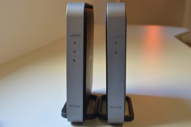 The Buffalo AirStation WZR-D1800H router (left) looks almost exactly the same as the WLI-H4-D1300 media bridge. These two are the very first 802.11ac Wi-Fi devices on the market.