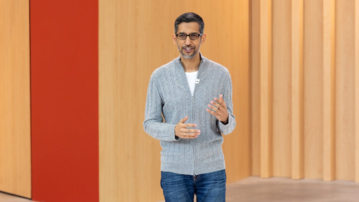 Google CEO Sundar Pichai touts his company's AI efforts from the stage of Google I/O 2023