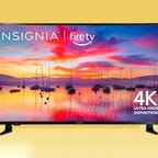 The Insignia 2023 50-inch F30 Series LED 4K UHD smart Fire TV is displayed against a yellow background.