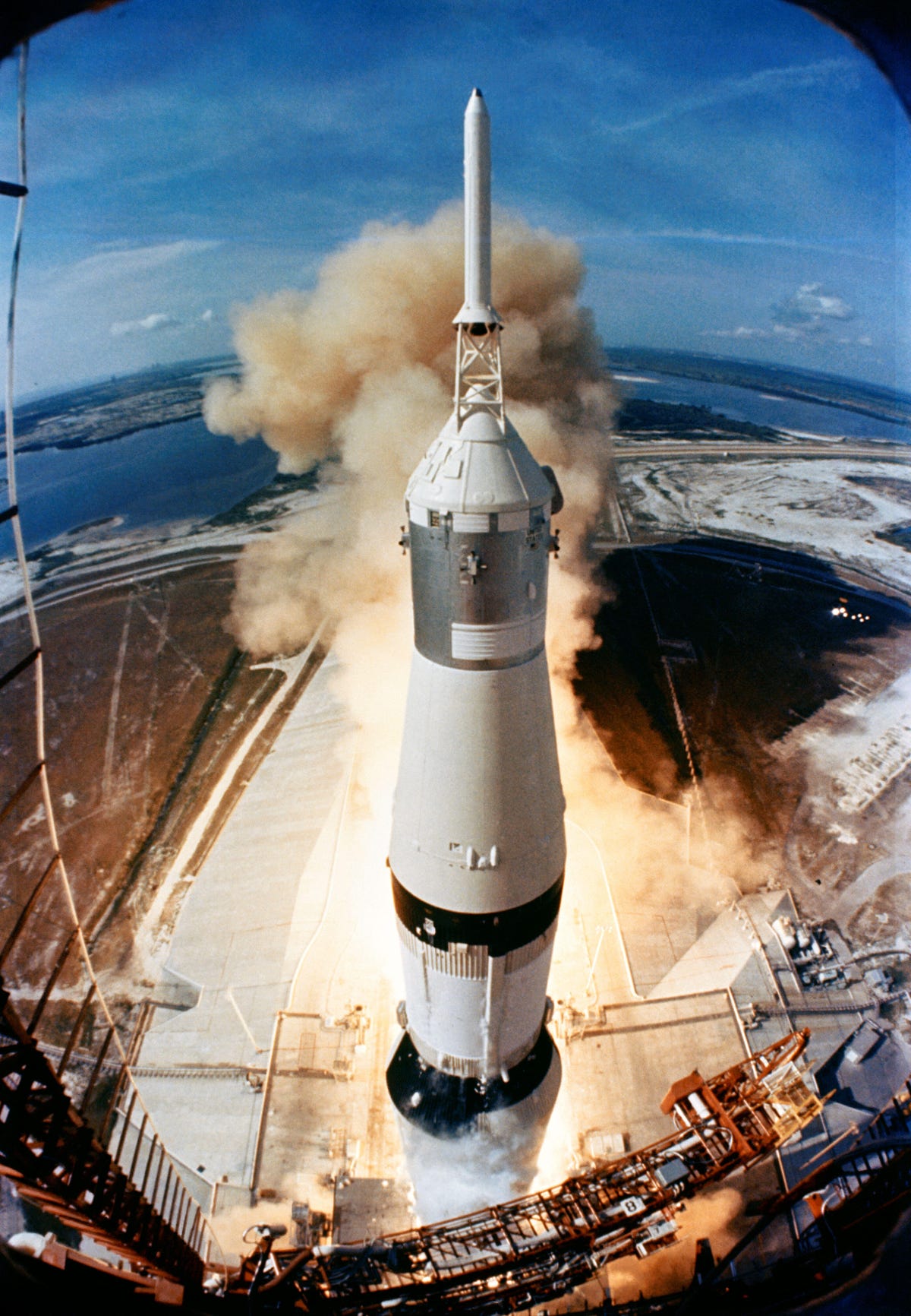 Massive Saturn V rocket takes off in a blaze of glory from Florida for the Apollo 11 mission.
