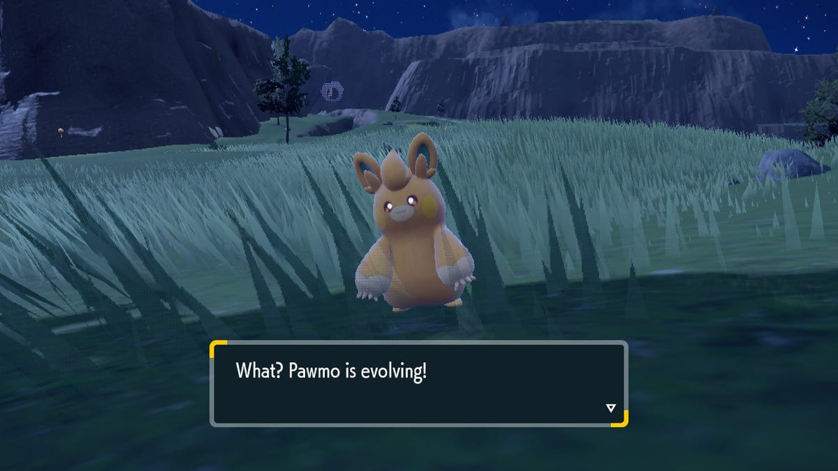 Pawmo in a field, with a caption: "What? Pawmo is evolving!"