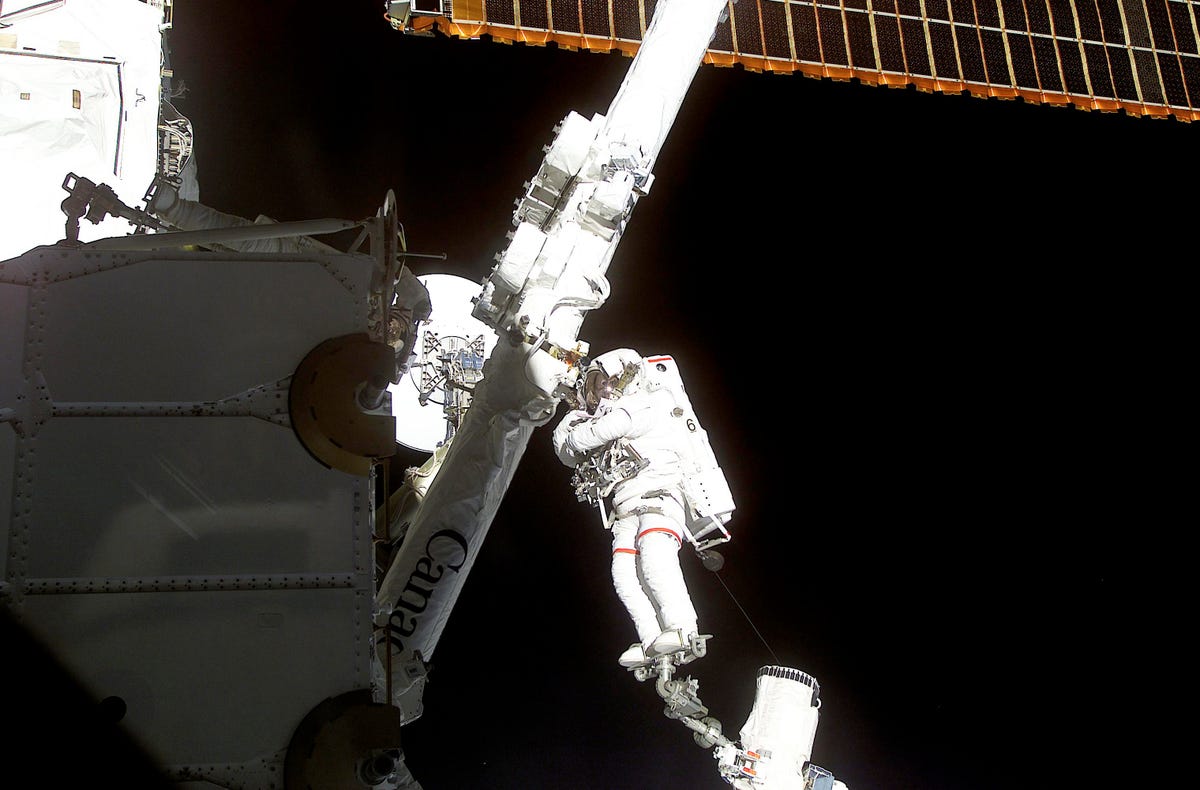 Astronaut Chris Hadfield working outside the International Space Station (STS-100)
