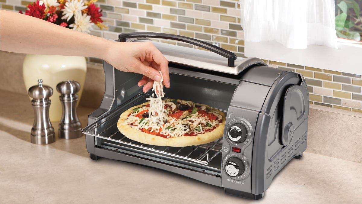 Cheese is just the beginning with the Hamilton Beach 31334 Easy-Reach 4-Slice Toaster Oven.
