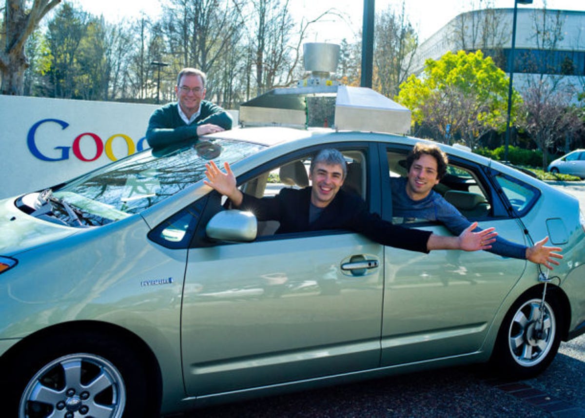 Google's self-driving car technology on display with co-founders Larry Page and Sergey Brin, along with executive chairman Eric Schmidt.