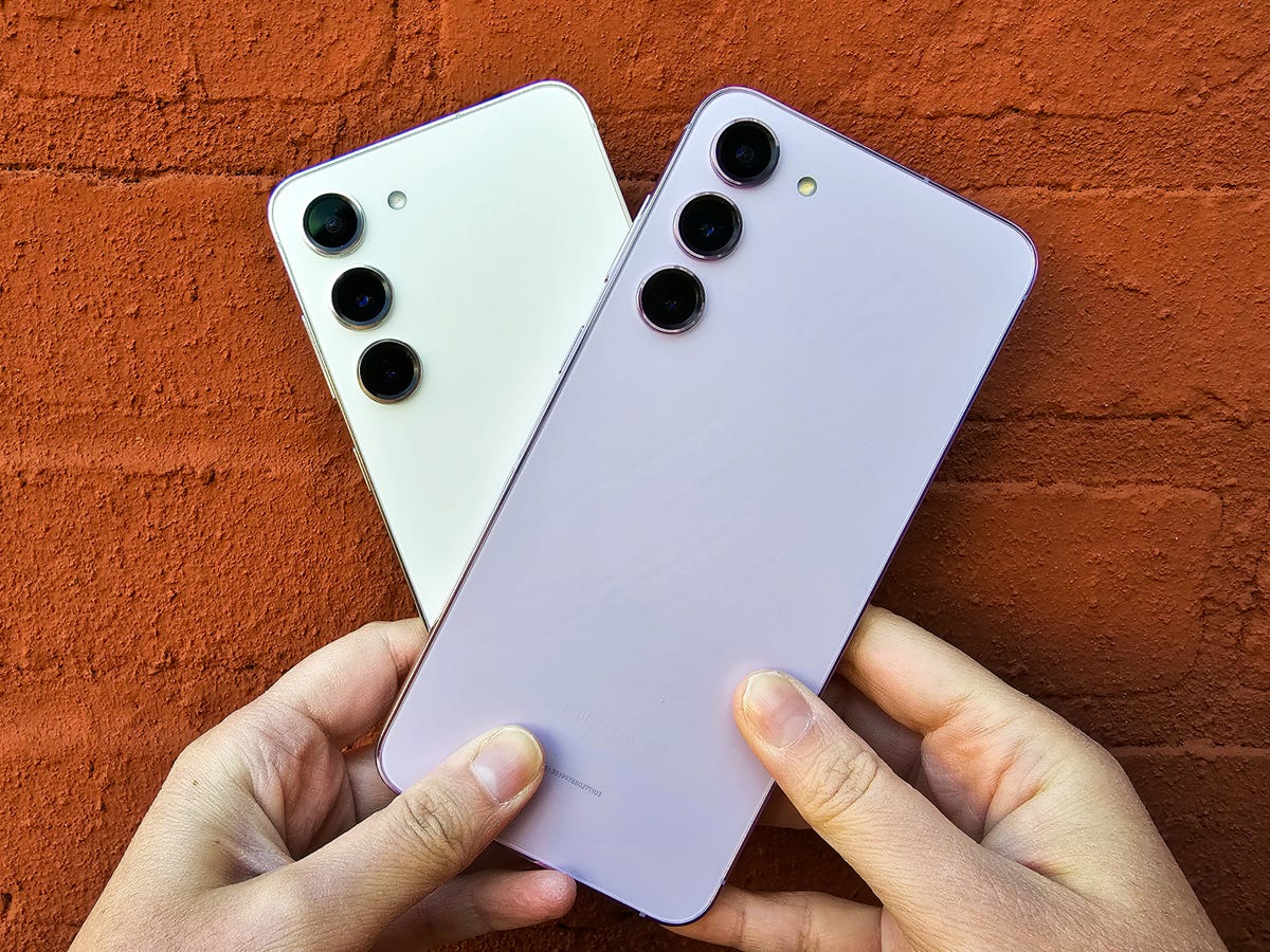 The Galaxy S23 (left) and S23 Plus (right) against a brick wall