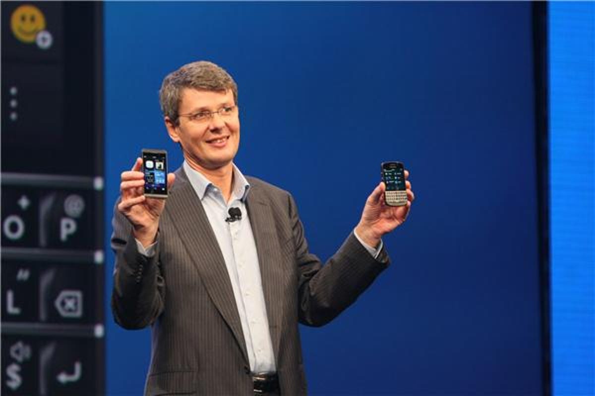 BlackBerry CEO Thorsten Heins showing off the Z10 (right) and Q10, which is launching in a few months.