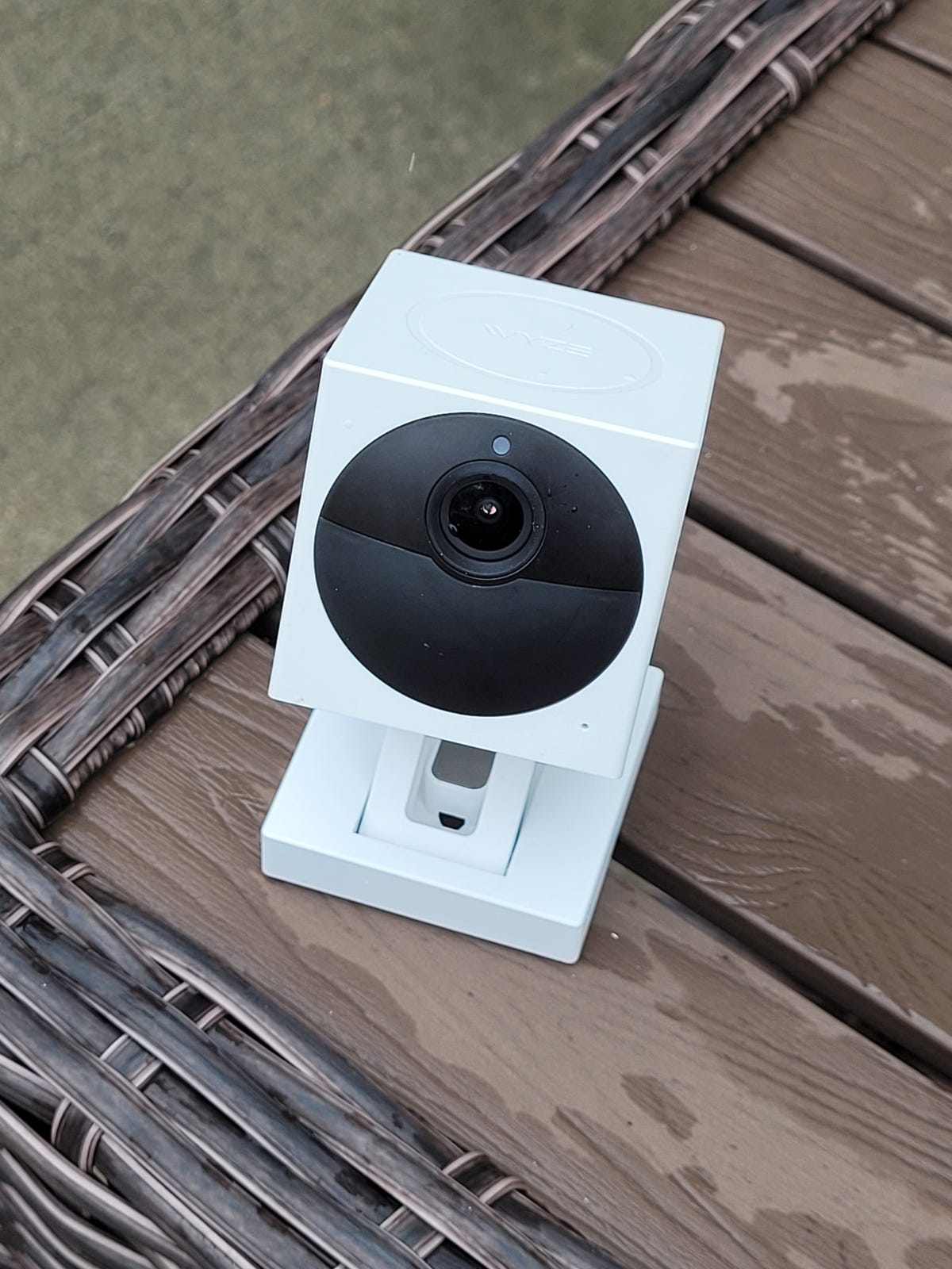 Wyze Cam Outdoor security camera placed on a table