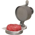 Metal hamburger press with a burger ready to cook