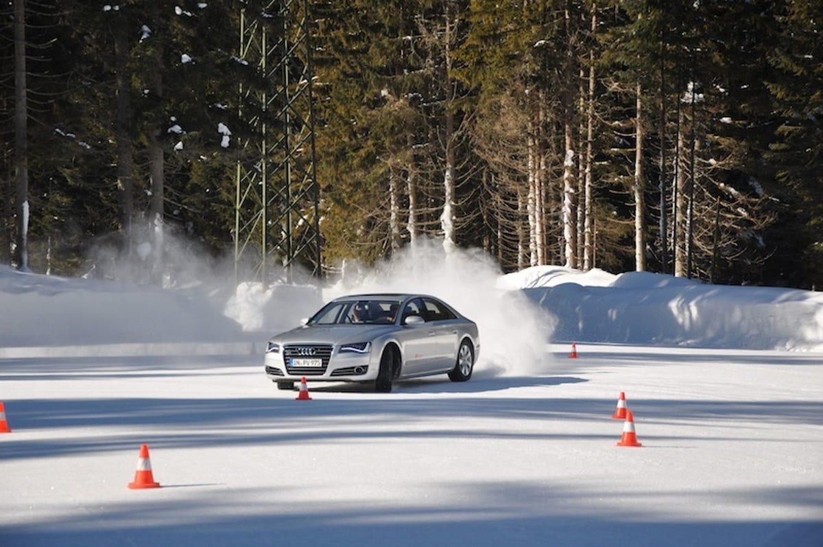 Classmates learning to power slide in the Audi A8.