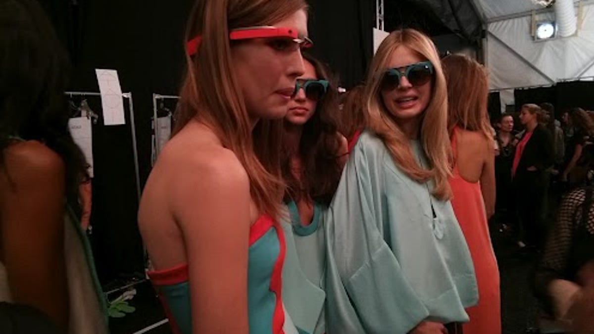 Models at a Diane von Furstenberg fashion event sport Google glasses.