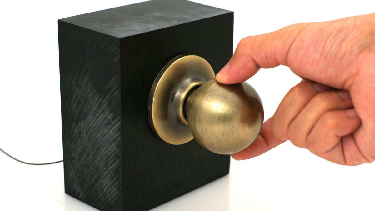 Smarter than your average doorknob: the Disney Pittsburgh-Carnegie Mellow touch-based gesture system delivers different commands based on how the doorknob is touched. Two fingers means show a "be right back" sign while a circular grasp will lock it.