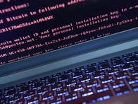 <p>A message demanding money on a computer hacked by a virus. Such viruses, or "ransomware," are part of what makes crime so easy in the digital age, says a report.</p>