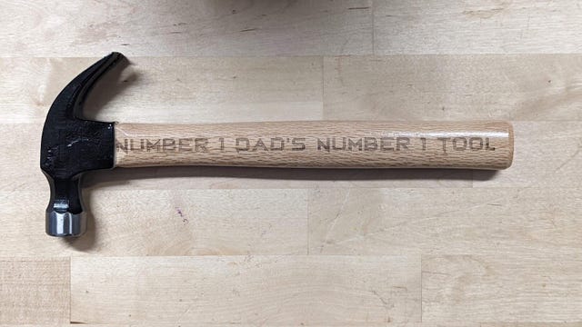 Hammer with number 1 dad etched into it