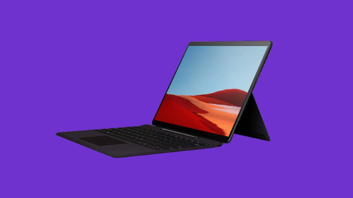 An open Surface Pro X against a purple background