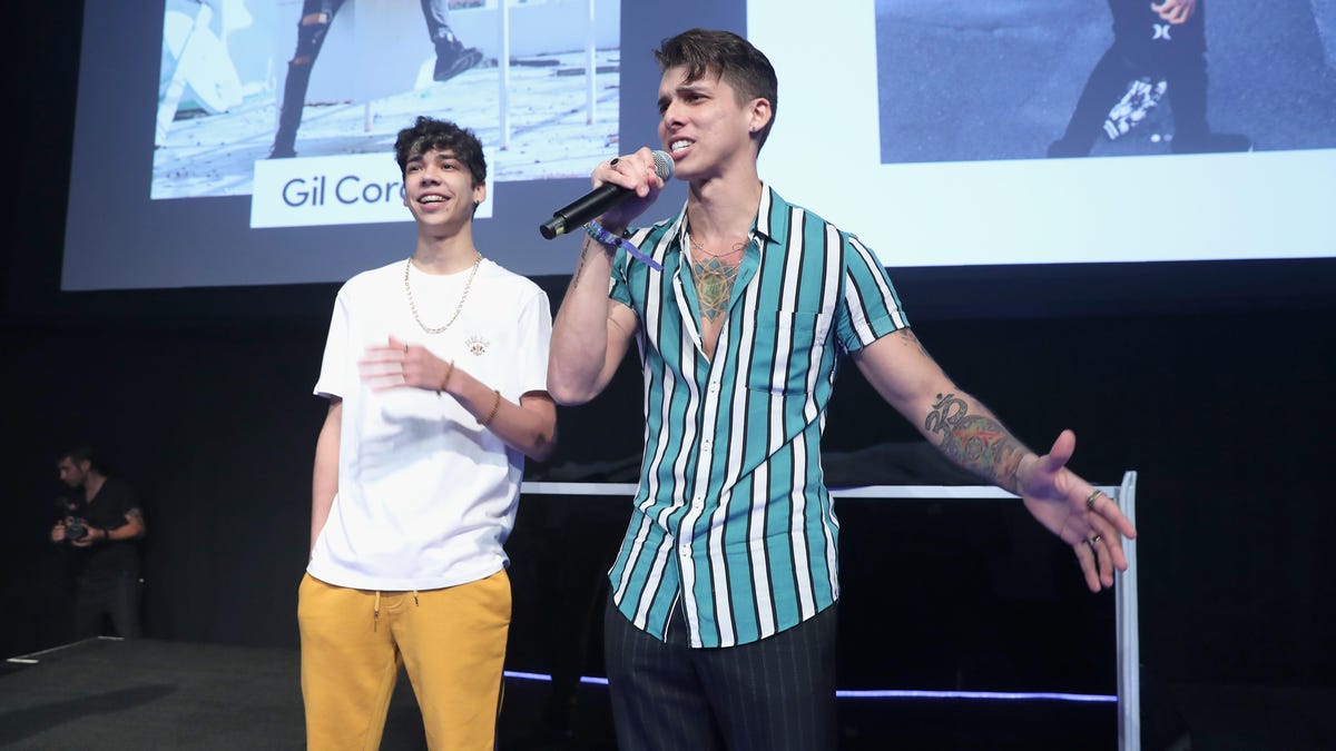 Gil Croes (right) and Jay Croes speak onstage at TikTok's US launch celebration