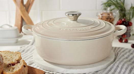 le creuset dutch oven round on table