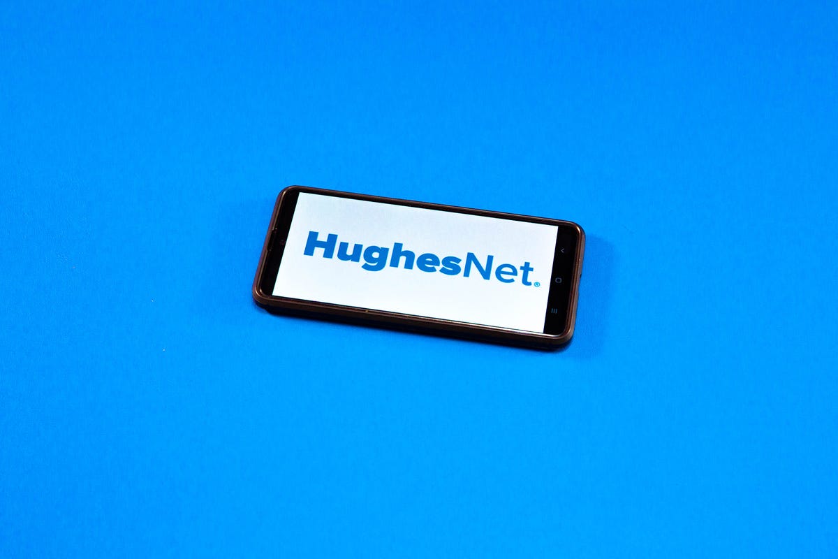 HughesNet logo connected  a phone