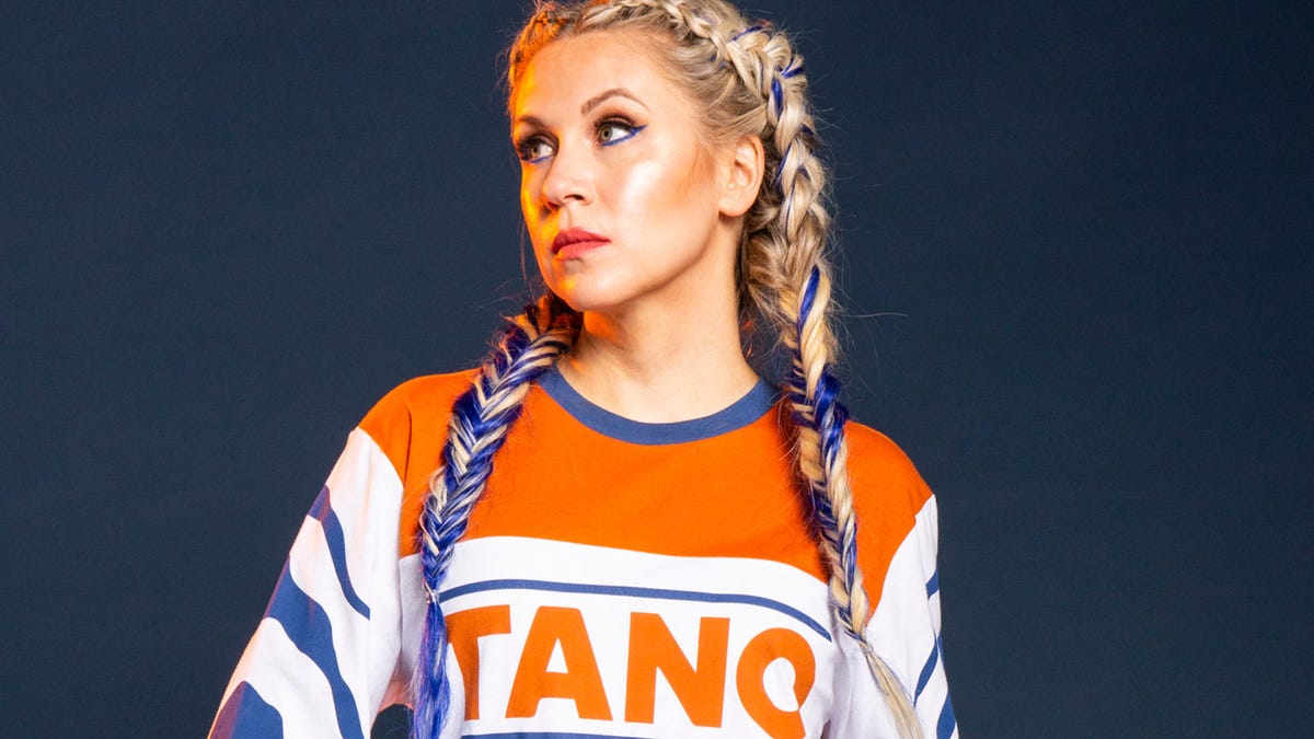 A model shows off the new blue and orange "Tano" t-shirt from the Her Universe Star Wars collection.