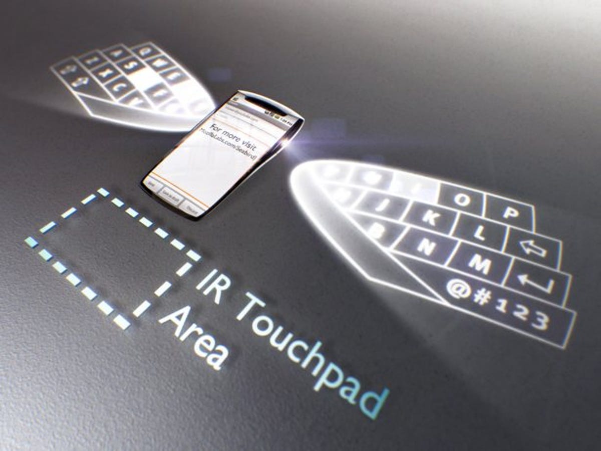 The phone would create a virtual keyboard and trackpad for better typing.
