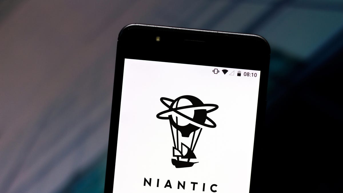 A black iphone with Niantic logo on the screen