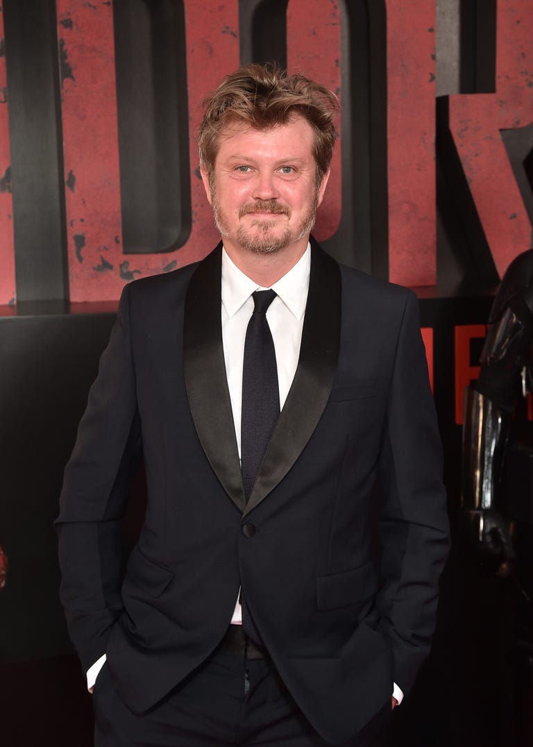 Beau Willimon smiles in front an 