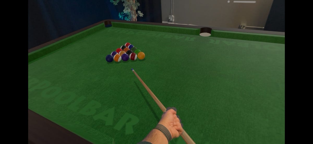 Playing a virtual pool game in Apple Vision Pro