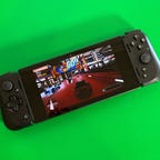 A racing game on the Razer Edge, a gaming handheld.