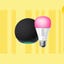 An Echo Dot smart speaker and a pink Kasa smart bulb against a yellow background.