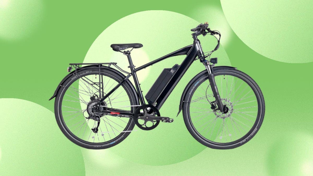 The CrossCurrent X e-bike is displayed against a green background.