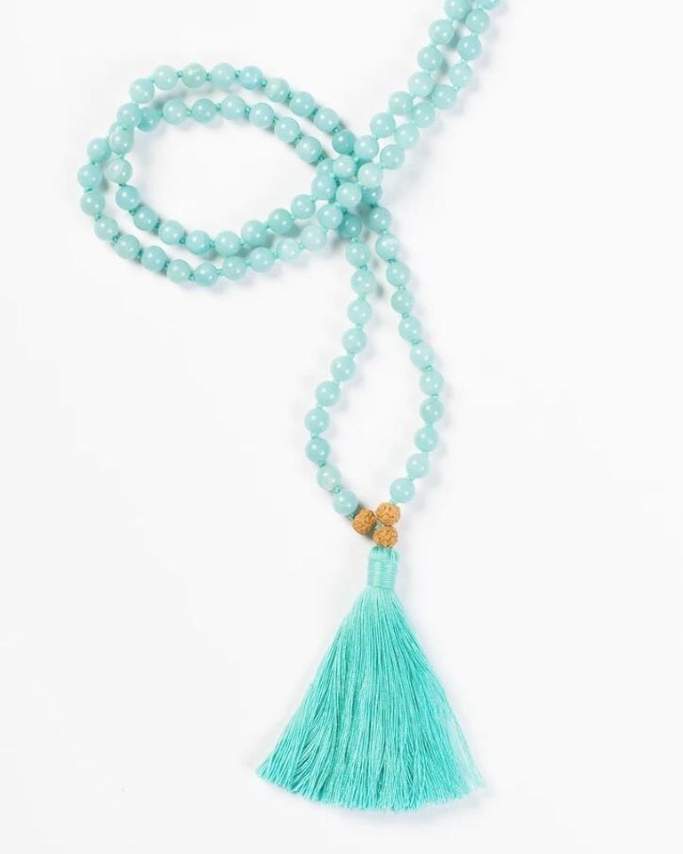 a string of beads with a tassel
