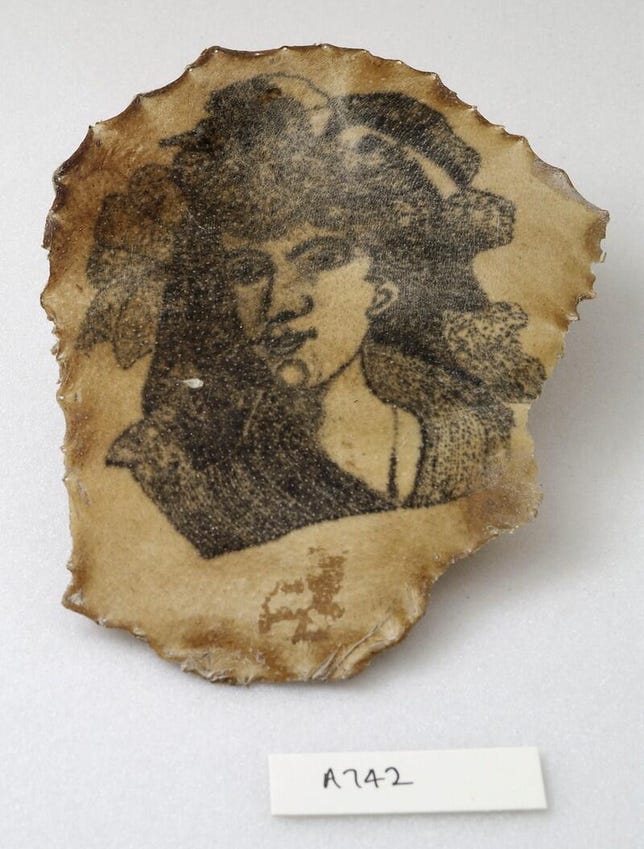 a-tattoo-on-a-piece-of-human-skin-showing-a-female-face-credit-wellcome-collection