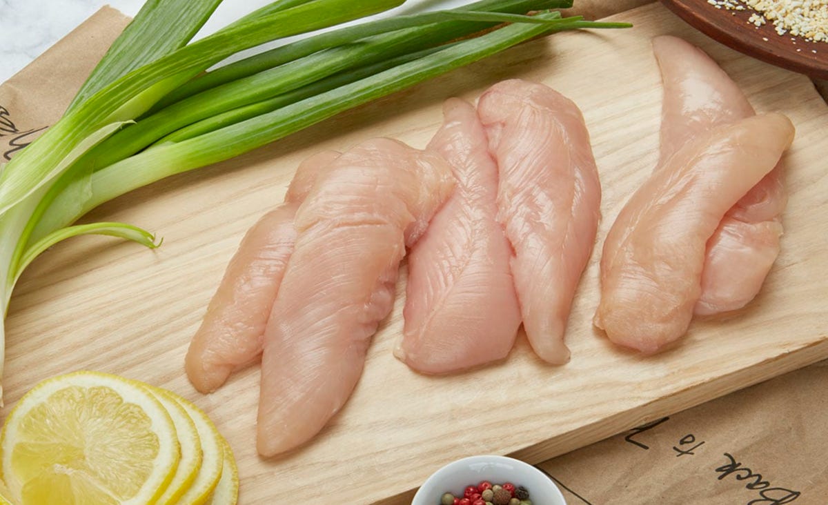 chicken tenders on cutting board