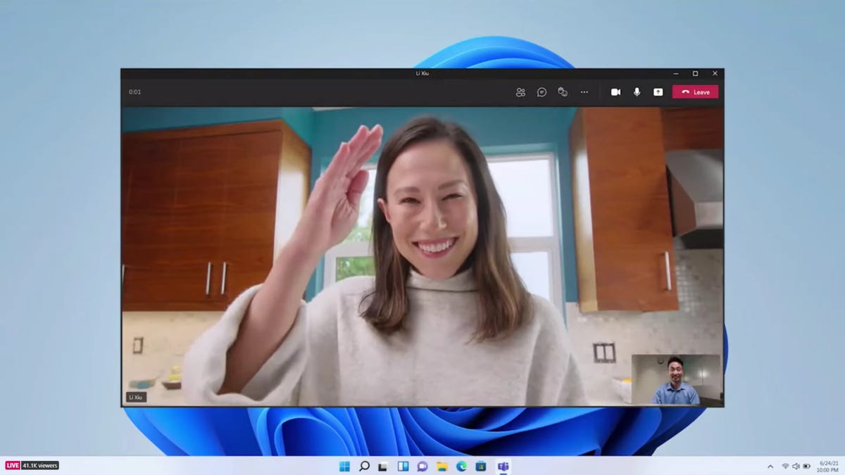 A person waving in a Microsoft Teams video