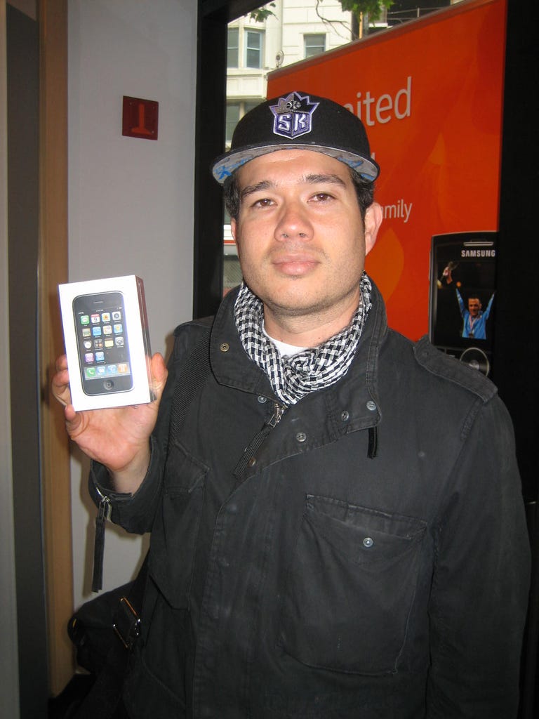 first guy with phone at att store