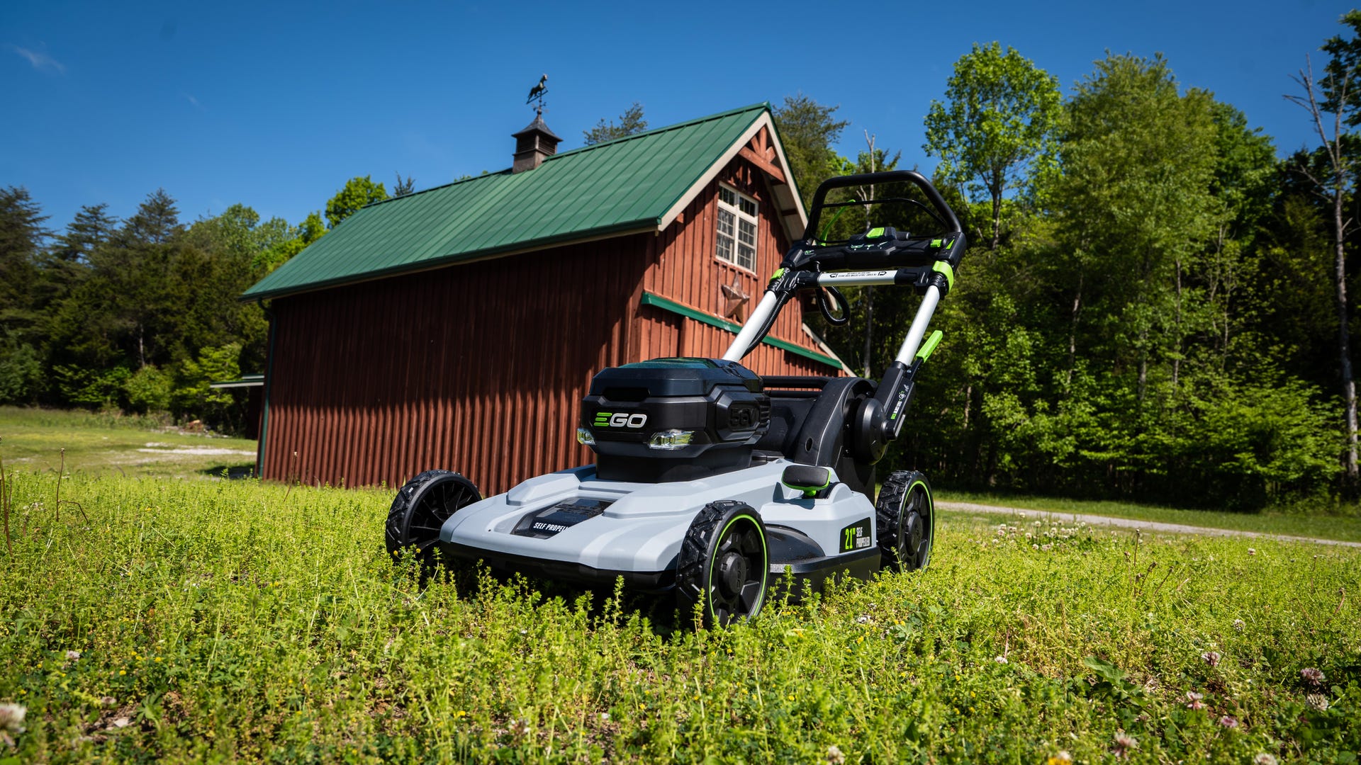 electric mower in grass