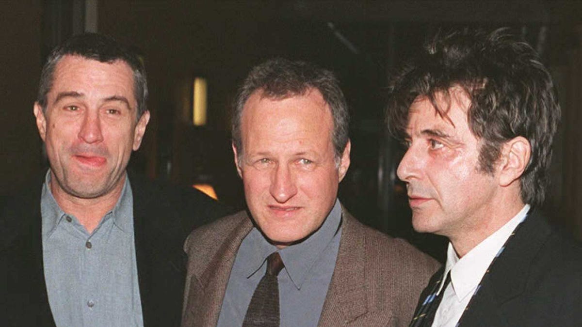 US actors Robert DeNiro (L) and Al Pacino (R) pose with director Michael Mann as they arrive for the 06 December world premiere of the film "Heat" in Burbank, California. The crime drama stars Pacino as a Los Angeles detective out to catch a notorious bank robber played by DeNiro