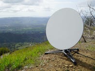 <p>Starlink antenna dish sitting on top of Mount Diablo</p>
