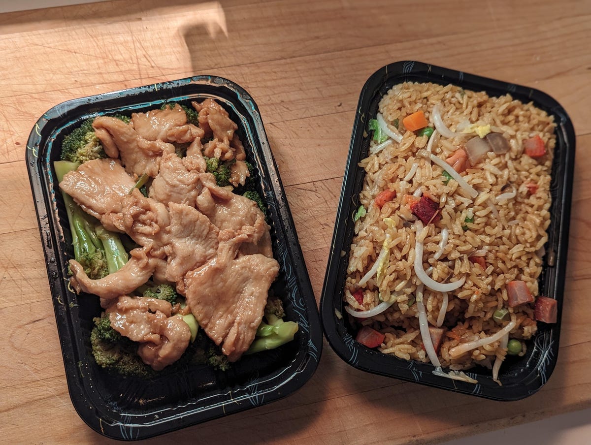 two containers of chinese takrout