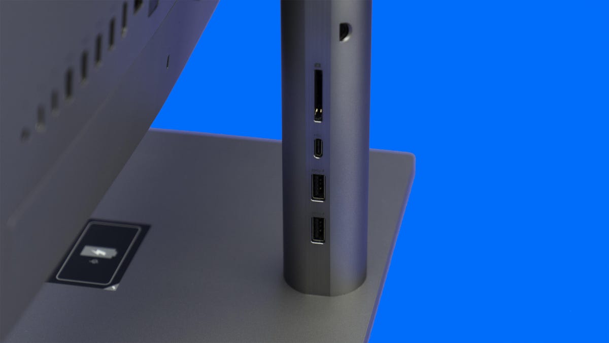 The ports on the side of the HP Envy 34 all in one's stand, one USB-C, 2 USB-A and an SD card slot.