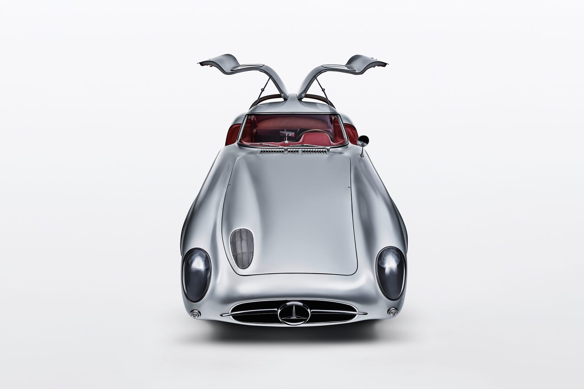 1955 Mercedes-Benz 300 SLR Uhlenhaut Coupe front view with gullwing doors open