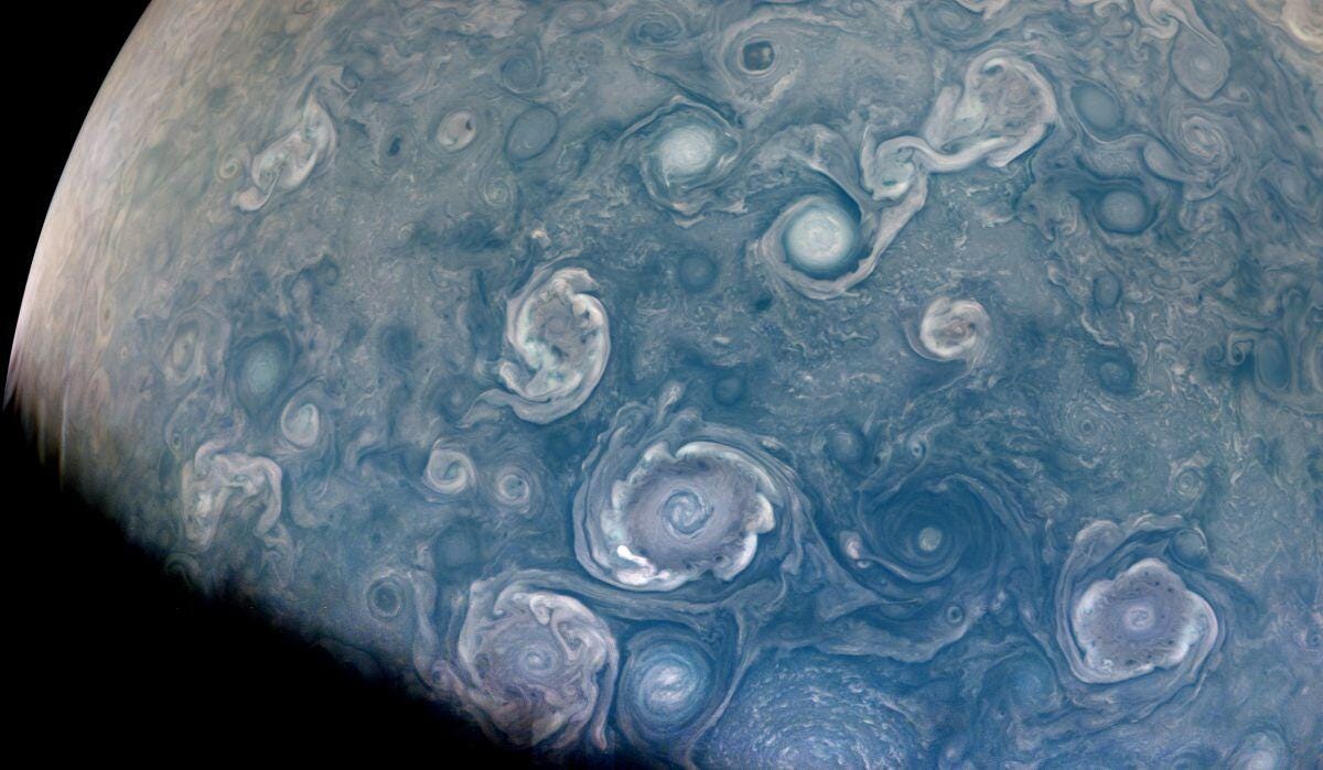 NASA's image of vortex-like swirls that represent giant storms on Jupiter.