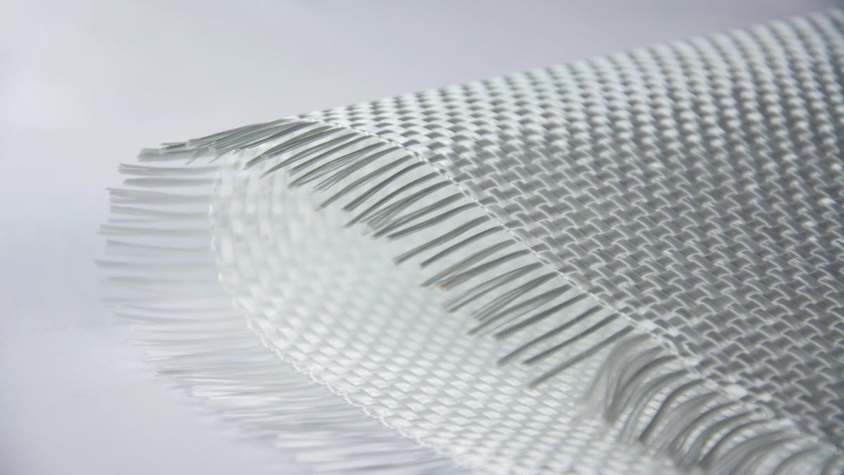 A sheet of white, woven fiberglass