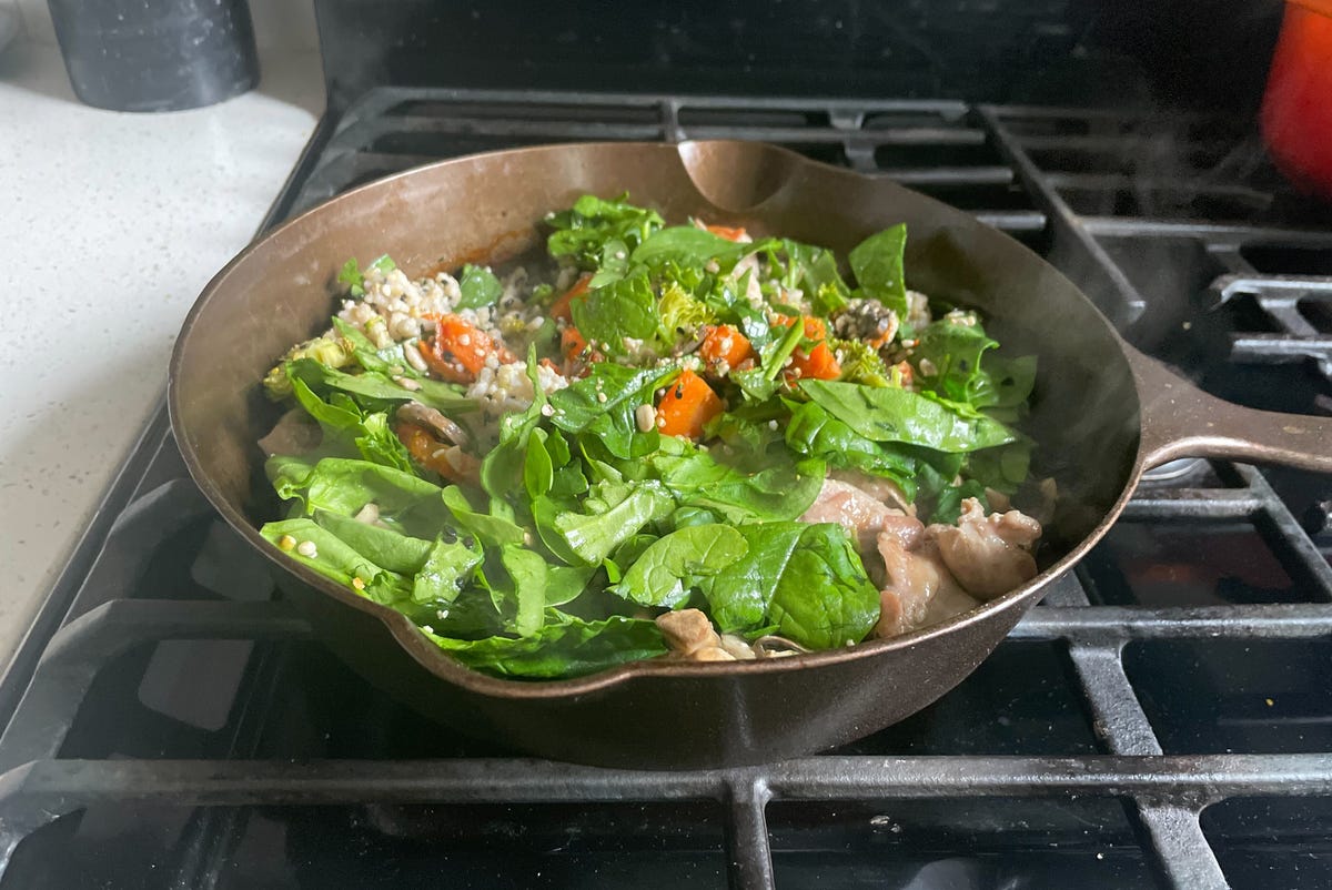 Pan with thistle meal being heated on stove