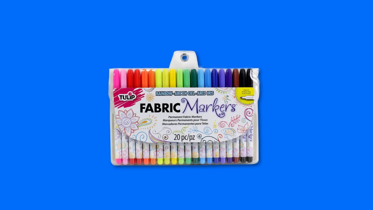 Multicolored fabric markers on a blue background