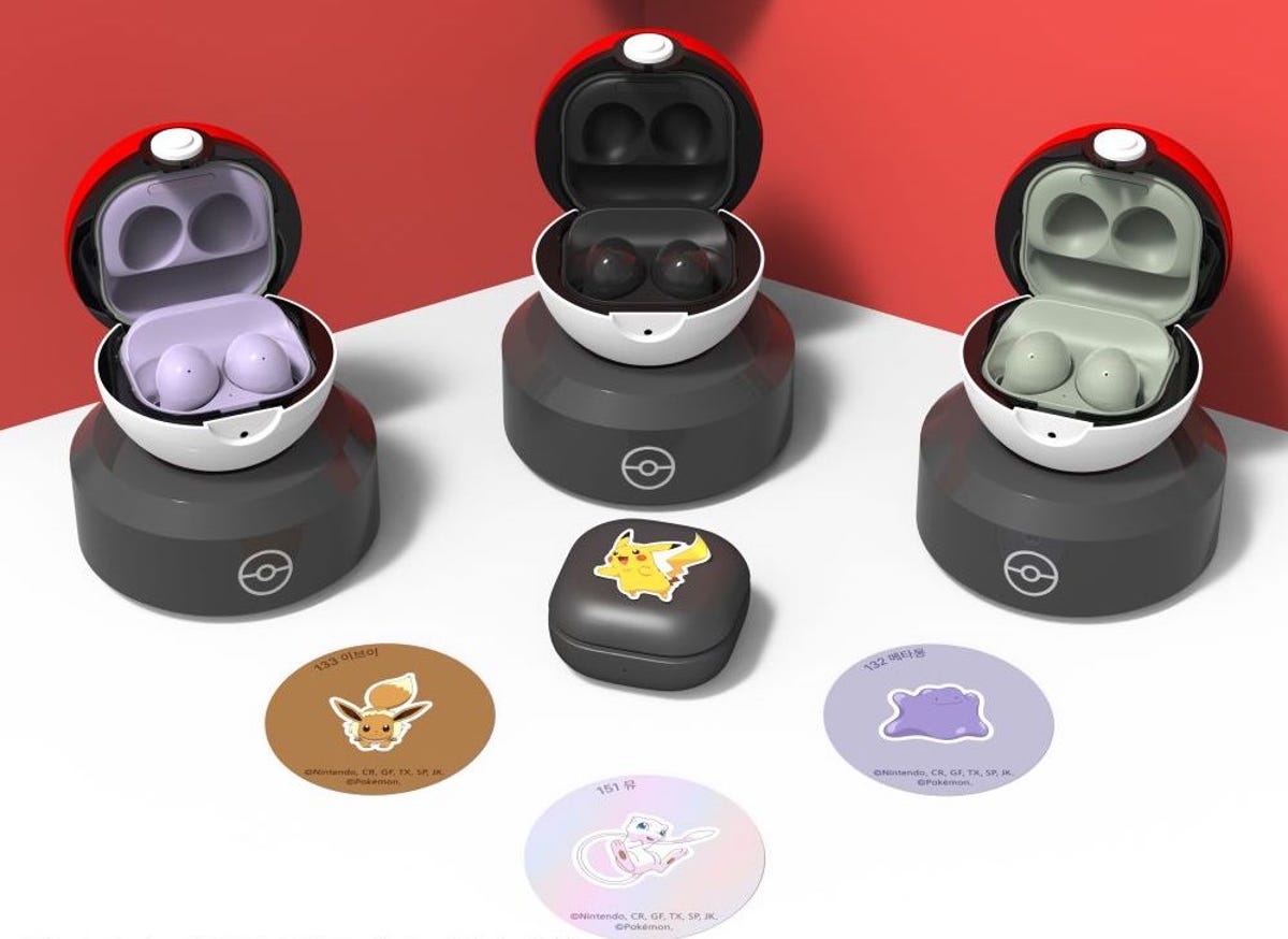 Poke Ball Galaxy Buds 2 Charging Case holders sit on pedestals, with Eevee, Pikachu, Mew and Ditto stickers spread out below
