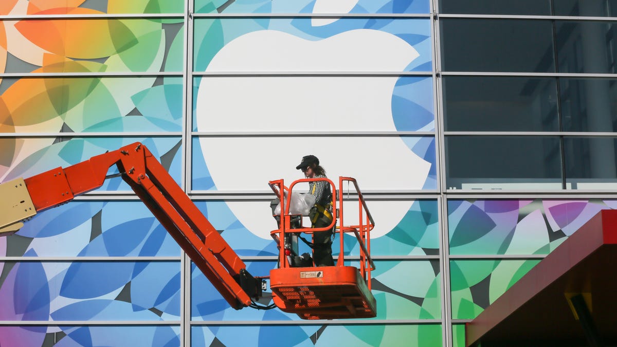 Workers decorating Yerba Buena Center for the Arts Theater in San Francisco for next week's Apple event.