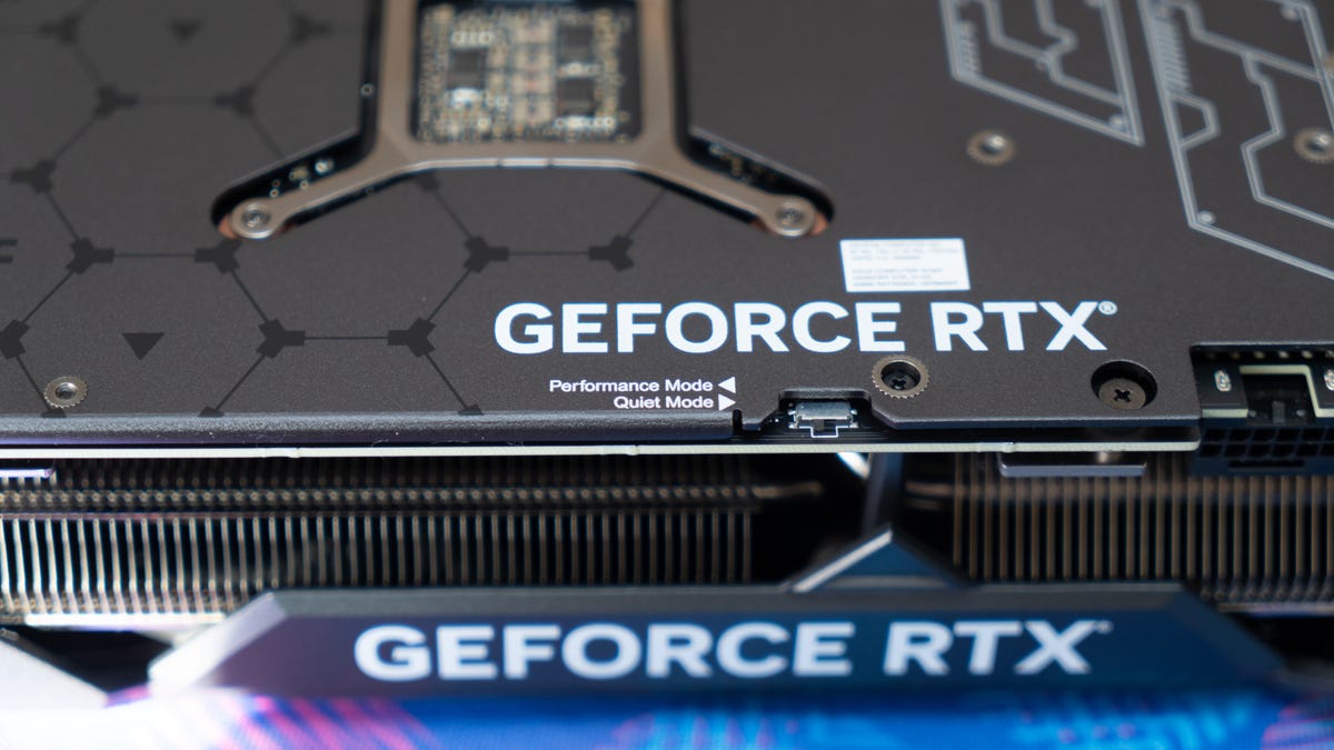 The Asus TUF GeForce RTX 4070 Ti OC close crop showing the physical switch for performance or quiet mode
