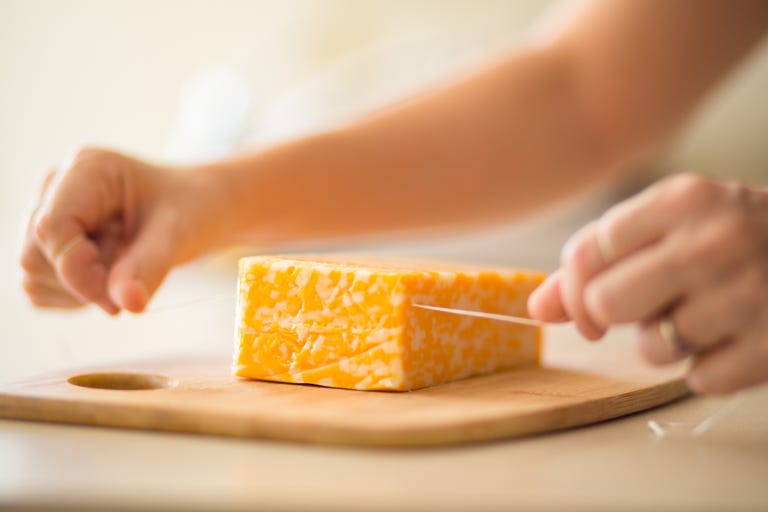 cutting cheese with. floss