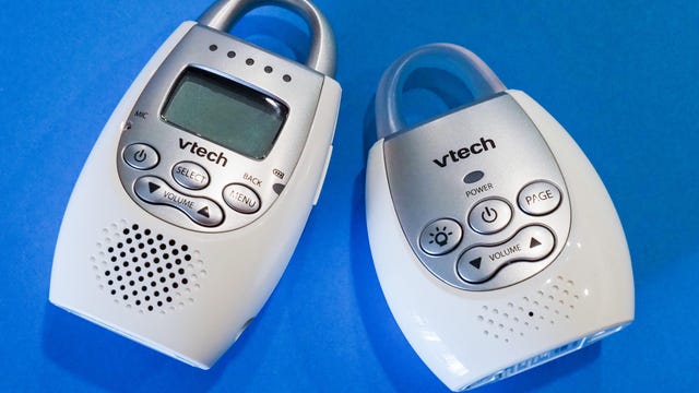 Two VTech baby monitors against a bright blue background 